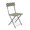 Chaise de jardin pliante Bistromania, tressage vert et blanc, structure en acier noir.