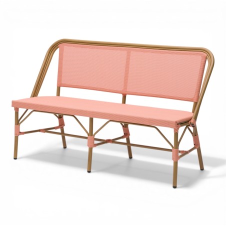 Banquette de terrasse de restaurant parisien au tressage rose et blanc